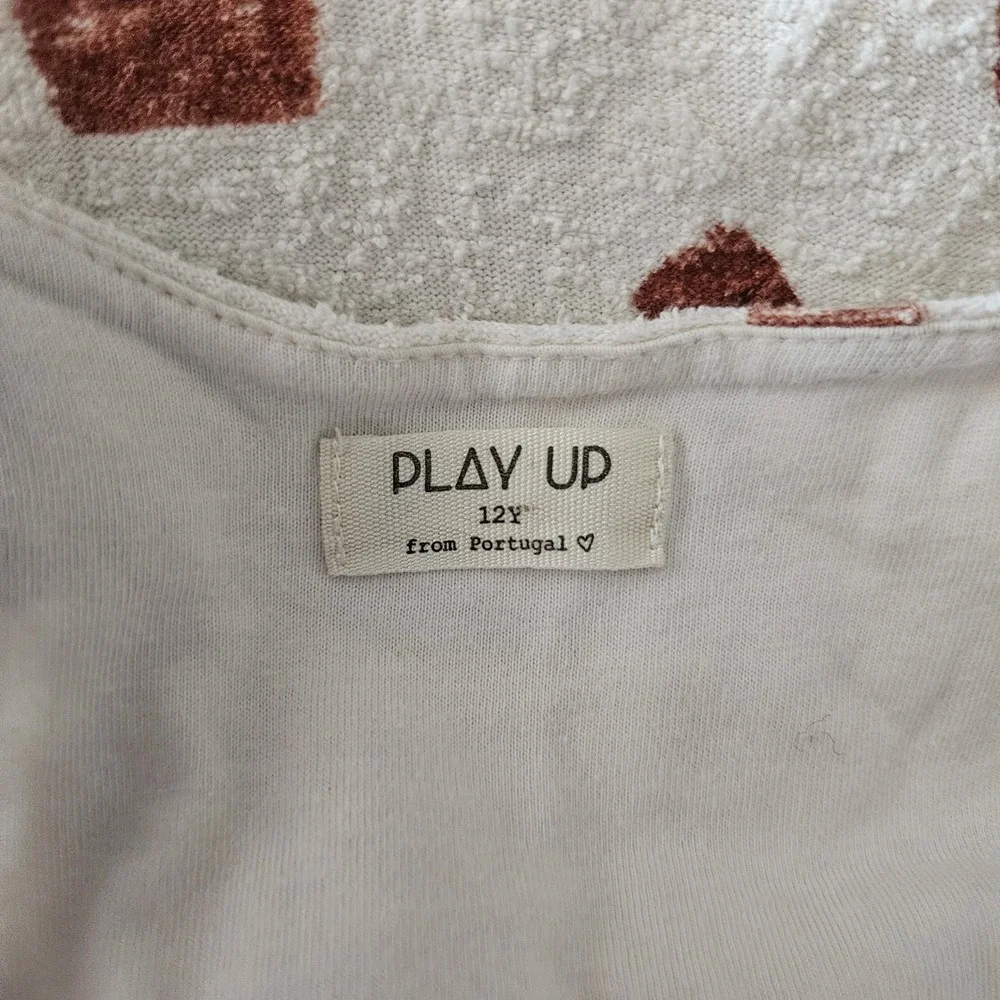 Play Up sleeveless organic